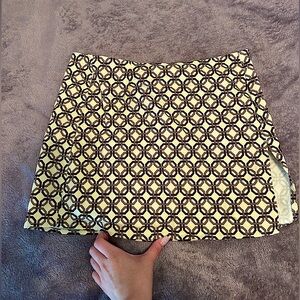 Motel Rocks a-line mini skirt with thigh slit in retro print
